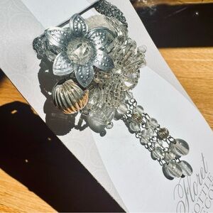 Wine bottle decor!
Two's Company Silver Floret Bottle decor